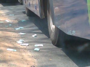 packets littered near bus heap of littered packets